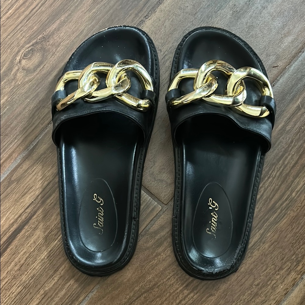 Saint G Black and Gold Sandals with Chain-Link Detail